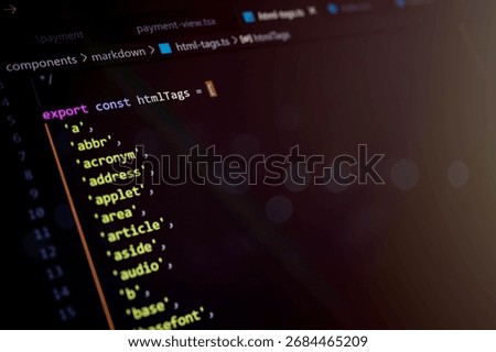 Close-up of JavaScript code displaying an array of HTML tags, representing web development, markup language education, frontend coding structure, and syntax elements in digital programming.