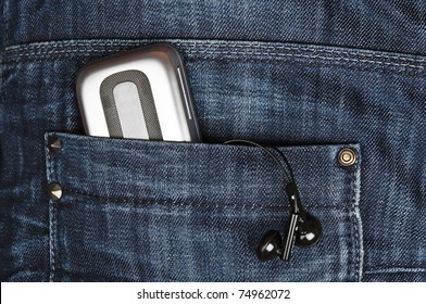 Closeup to jeans pocket with phone