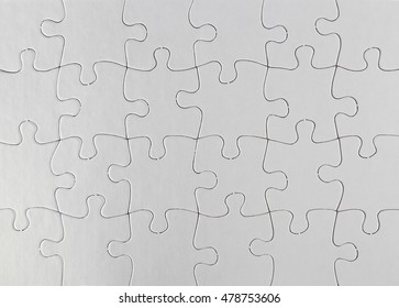 Closeup of jigsaw puzzle pattern - Shutterstock ID 478753606