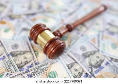 Close-up Of Judge Gavel And Pile Of Money Banknotes. Judgement And Bribe. Corruption Concept