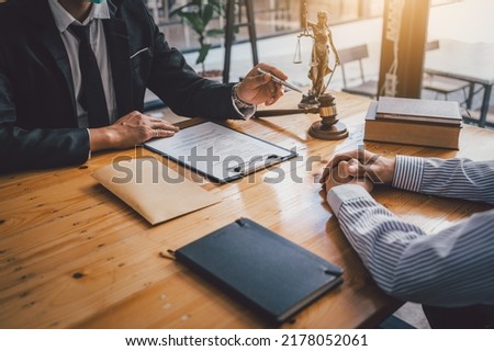 Close-up of a judge with a hammer against the background of professional lawyer talking about a lawsuit. professional lawyers discussing legal case. Stock foto © 