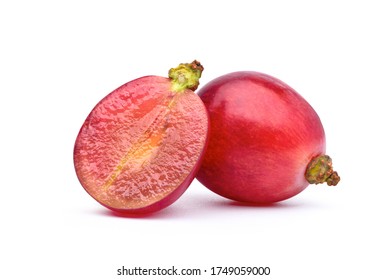Close-up Juicy Red grapes with cut in half isolated on white background. Clipping path.