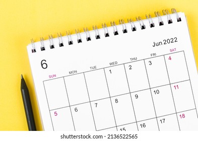 Close-up June 2022 desk calendar on yellow background. - Shutterstock ID 2136522565