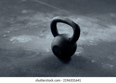 Close-up Of Kettlebell With Chalk Around At The Gym