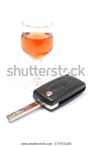 Closeup of\
key car with glass of wine, key car and alcohol, don\'t drink and\
drive concept. Isolated on white\
background