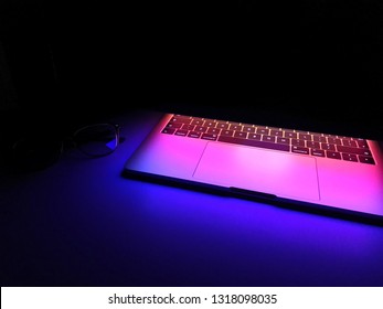 Closeup of keyboard illumination Multicolour Rainbow colors for play Games Online. backlit keyboard Concept - Shutterstock ID 1318098035