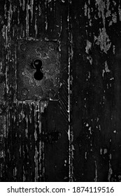 Close-up Keyhole Macro Details From A Weathered Door.