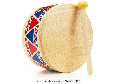 Close-up Of Kid's Drum With Mallet On White Background