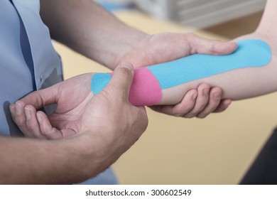 Close-up Of Kinesiology Taping After Wrist Injury