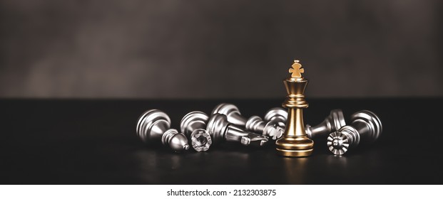 Close-up King Chess Standing On Falling Chess Concepts Of Wining To Challenge Or Battle Fighting Of Business Team And Leadership Strategy And Organization Risk Management Or Team Player.