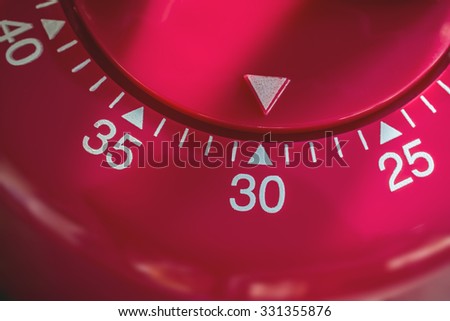 Closeup Of A Kitchen Egg Timer - 30 Minutes