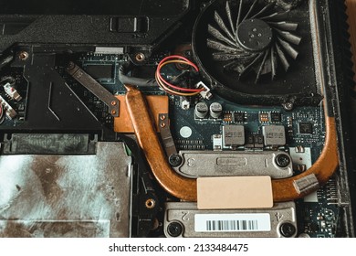 close-up of laptop cooling system, motherboard, laptop repair and maintenance