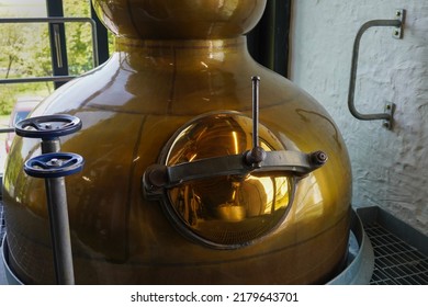 Close-up Of A Large Copper Still In A Whisky Distillery In Scotland. It Is Used For The Alcohol Distillation.	