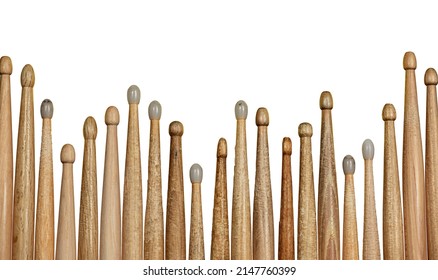 Close-up Of A Large Group Of Used Wooden Drumsticks Isolated On White Background. Percussion Instrument.