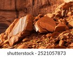 Close-up of large red boulders and sandstone Mesa in Monument Valley.