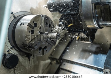 Close-up of a lathe operating in a numerical control factory