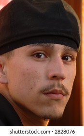 Closeup Of A Latino Gang Member Looking Fearsome