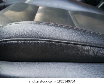 Closeup Of Leather Car Seat Texture Background. 