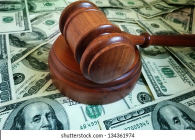 Closeup Of A Legal Gavel On US Cash