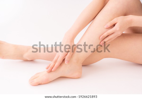 Close-up of\
the legs of a Japanese woman in the\
room