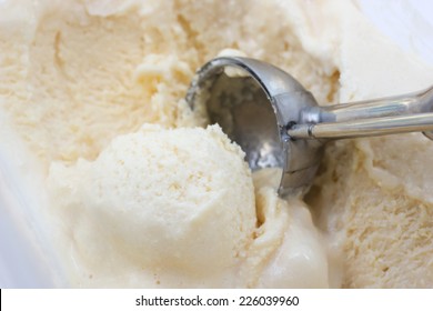 Closeup Lemon Ice Cream With Scooper.