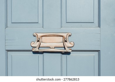 Closeup Of Letter Box In A Wooden Door Close Up