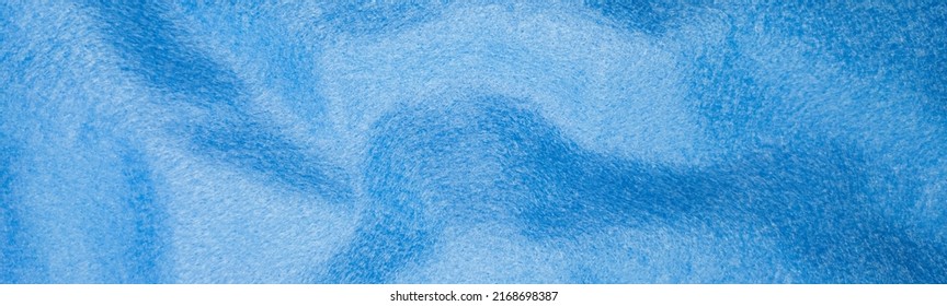 Close-up of light blue  texture fabric cloth textile background (celestial color)