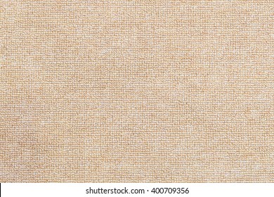 Close-up of the light brown carpet texture background in the meeting room.The texture of light brown carpet texture.