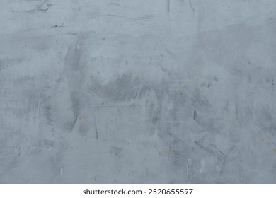 Close-up of a light gray, textured concrete surface with subtle scratches and marks. The minimalist and industrial feel makes it perfect for backgrounds or design elements. - Powered by Shutterstock