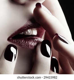 Close-up Of Lips And Nails