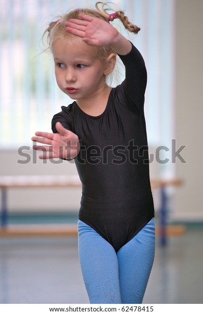 Closeup Little Gymnast Girl Doing Exercises Stock Photo 62478415 ...