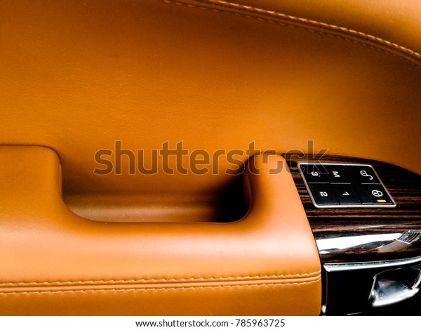 closeup of the lock and unlock panel of an exotic\
luxury car