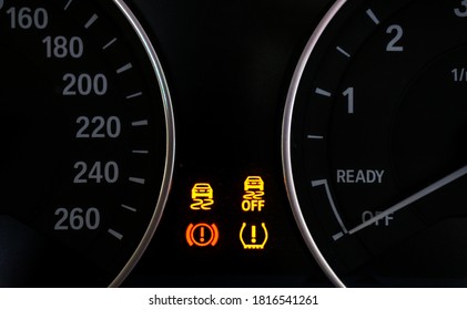 Closeup Of Lose Tyre Pressure With Stability Control System Alert In Dashboard Car On Background.	
