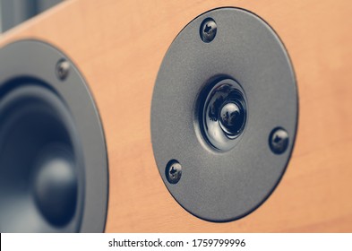 Closeup of loudspeaker for music and home theater system. Vintage color style