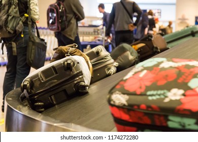 Closeup Of Luggage Bag On Airport Conveyor Belt For Pickup