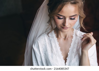 Close-up Of A Luxurious Bride In A Wedding Robe In The Morning In Her Interior.