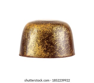Closeup of luxury handmade bonbon isolated on white background. Exclusive handcrafted chocolate candy with gold splashes. Product concept for chocolatier or pastry shop