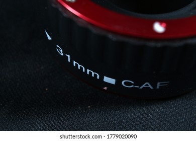 close-up macro adapter, with additional external flash lighting, background wallpaper - Shutterstock ID 1779020090