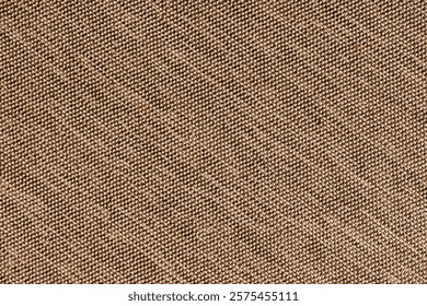 Closeup, macro of brown fabric texture background. Satin diagonal weaving cloth structure, canvas. Textile for decor, upholstery, garment. Wallpaper, backdrop.
