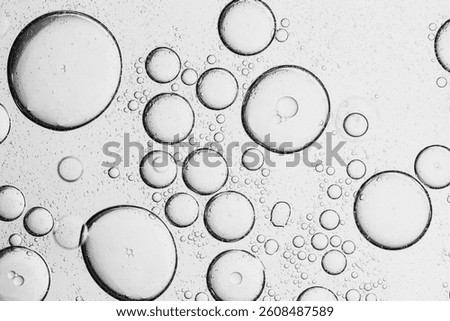 Close-up macro bubble texture,Close up macro Aloe vera gel serum cosmetic texture blue background with bubbles. Cruelty free. Lemongrass gel skincare product. antibacterial liquid with aloe vera, mois