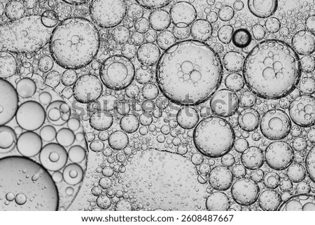 Close-up macro bubble texture,Close up macro Aloe vera gel serum cosmetic texture blue background with bubbles. Cruelty free. Lemongrass gel skincare product. antibacterial liquid with aloe vera, mois