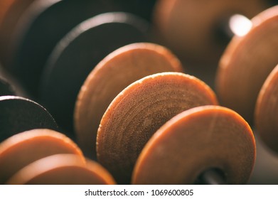 Close-up Macro Photo Of Vintage Abacus For Calculation