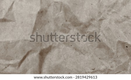 Close-up macro texture of crumpled brown kraft paper with natural wrinkles and folds. Abstract recycled paper background with organic creases, rough surface, and earthy tones, ideal for design templates, packaging, eco-friendly concepts, and creative backgrounds.