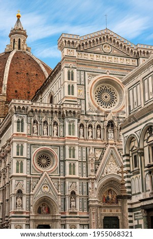 Close-up of the main facade of the Florence Cathedral, Santa Maria del Fiore, with the dome of Brunelleschi and the Baptistery of San Giovanni. UNESCO world heritage site, Tuscany, Italy, Europe.