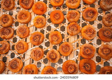 Close-up of Making Dried Persimmons ,Sun dried persimmon fruit dried persimmon processing - Powered by Shutterstock