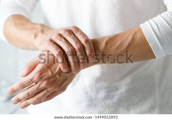 Closeup Male Arms Holding His Painful Stock Photo (Edit Now) 1499052893