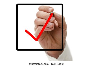 Closeup Of Male Hand Drawing Red Tick In Check Box On Virtual Screen.