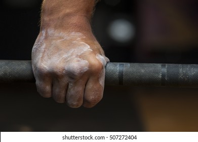 Closeup Of Male Hand Holding Barbell. Weightlifting, Power Lifting Or Cross Fit Training.