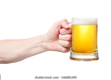 Closeup Of A Male Hand Holding Up A Glass Of Beer Over A White Background 