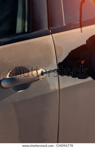 Closeup Male Hand Screwdriver Unlocking Car Stock Photo